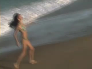 029 Tefi running and playing on beach.mp4